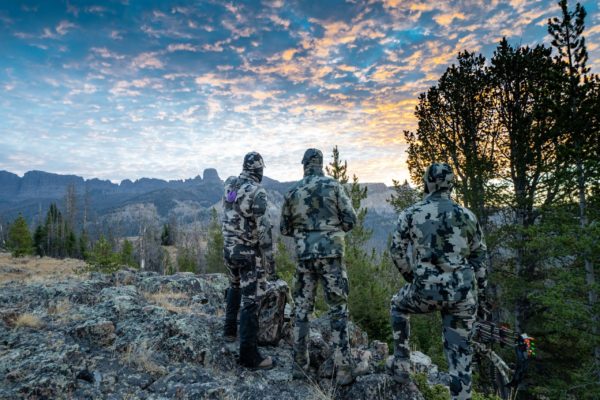Hunters making a game plan for a morning hunt.